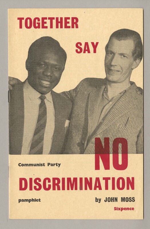 The cover features a black man in a suit and tie to the left and a white man in a shirt and stripe suit to the right. Both are facing towards the camera and embracing each other to express their solidarity for each other. 