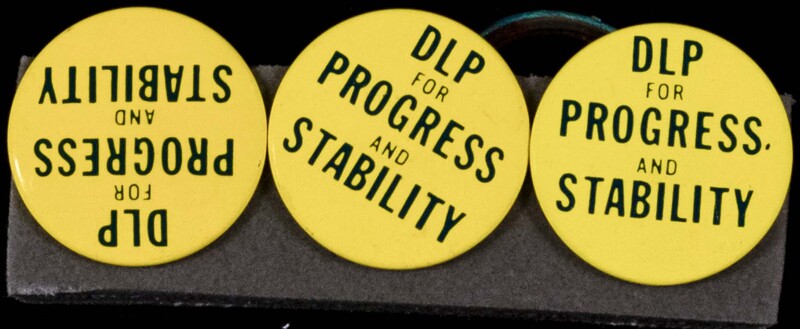 A row of three yellow badges with the slogan 'DLP for progress and stability'.