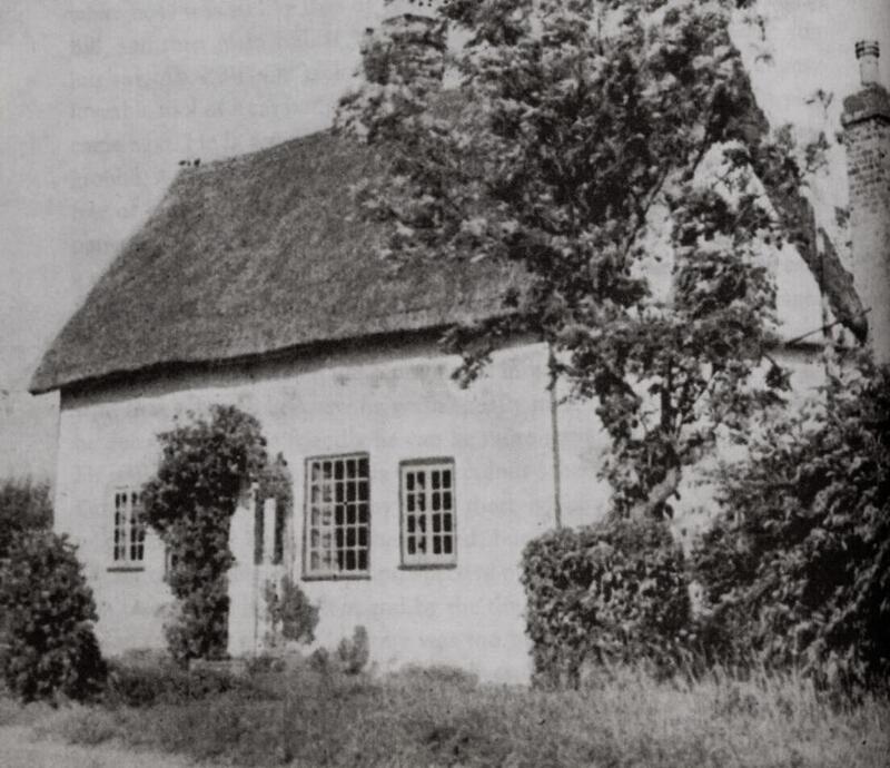 Photograph of the exterior of E.M. Barraud's cottage in Cambridgeshire. 