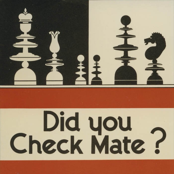 Cropped image of a black, white and red poster showing chess pieces.