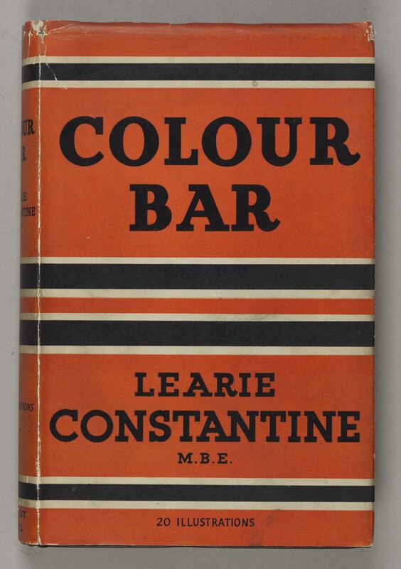 The orange, black and white striped dust jacket of 'Colour Bar'.