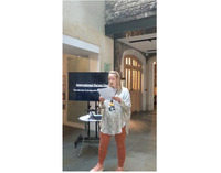 Sophie Denman stands giving talk for International Nurses Day.