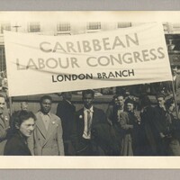 Photograph of members of Caribbean Labour Congress (London Branch) with banner