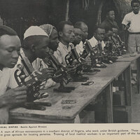 A team of African microscopists at work. From: Great Britain. Central Office of Information. London: published by His Majesty“s Stationery Office, 1949 [FCDO Historical Collection OVERSIZE DA11 GRE]