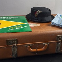 John Mark Adamson's grip (suitcase), pork-pie hat, airmail letters and vinyl