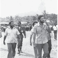 Maurice Bishop (right) while Prime Minister of Grenada. Image from Phillip-Dowe et al, Perspectives on the Grenada Revolution (2017), p. 152